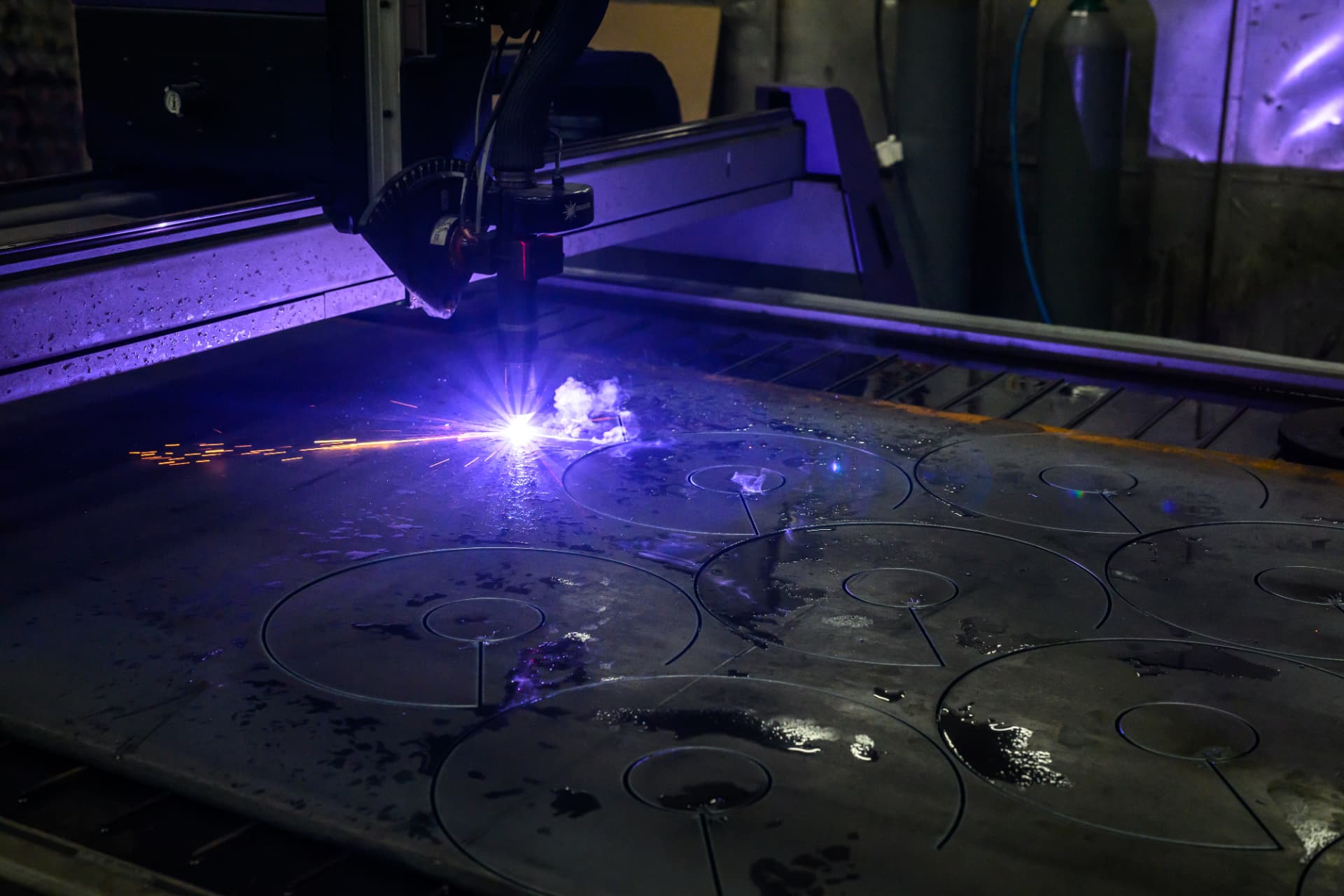 Plasma cutting steel components on the manufacturing table